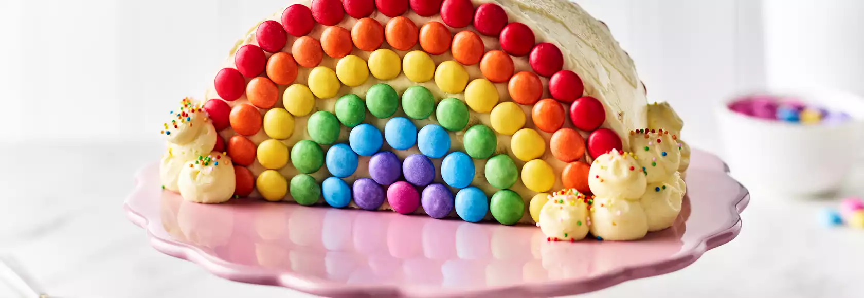 Surprise Skittles rainbow cake | Sainsbury`s Magazine